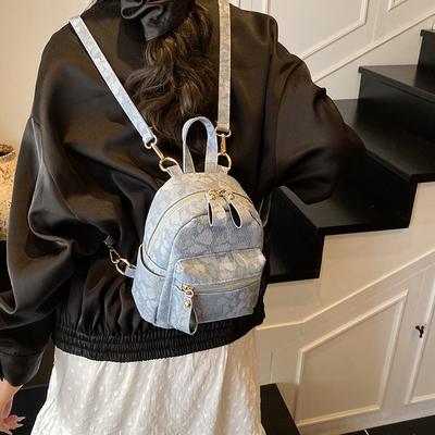 Nischentextur kleine Tasche Damentasche neues Gefühl vielseitig Pendler kleiner Rucksack Student Umhänge-Rucksack