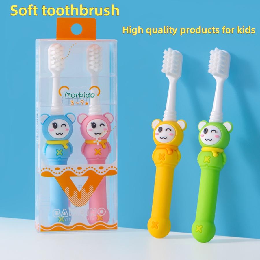 

Children s soft bristle toothbrush suitable for ages 3-9, with a soft rubber handle and cute cartoon shape