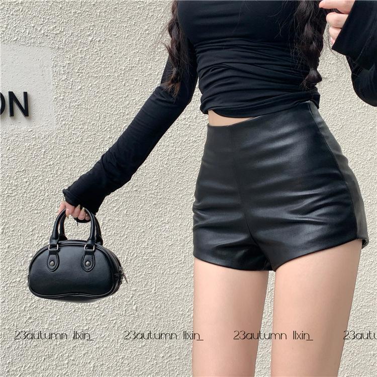 Pu Leather Bag Hip šortky Dámské Podzimní a Zimní Slim Vysoký pas Slim Sexy Hot Girl Černá Svrchní boty Kalhoty Rovné kožené kalhoty