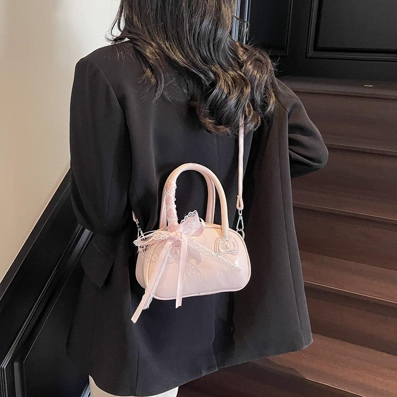 Spring and summer hand carry bow pillow bag women's new simple and fashionable shoulder bag high-end messenger bag