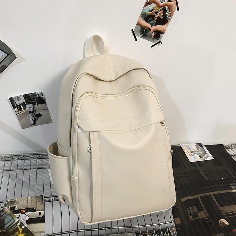 Solid Unisex Backpack Color Pu Material With Padded Straps For School And Trips