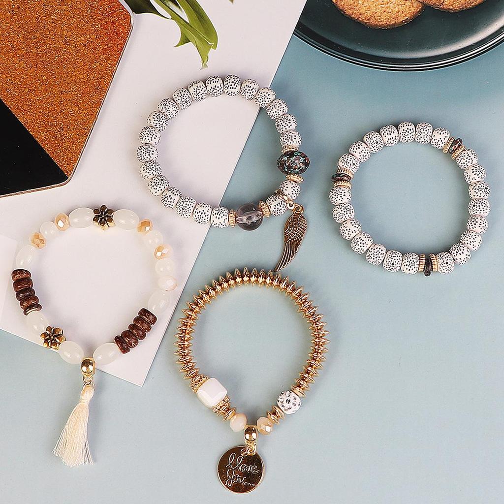 Bohemian Trendy Bracelet with Wings, 'I Love You' Tassel Pendant, and Retro Creative Design