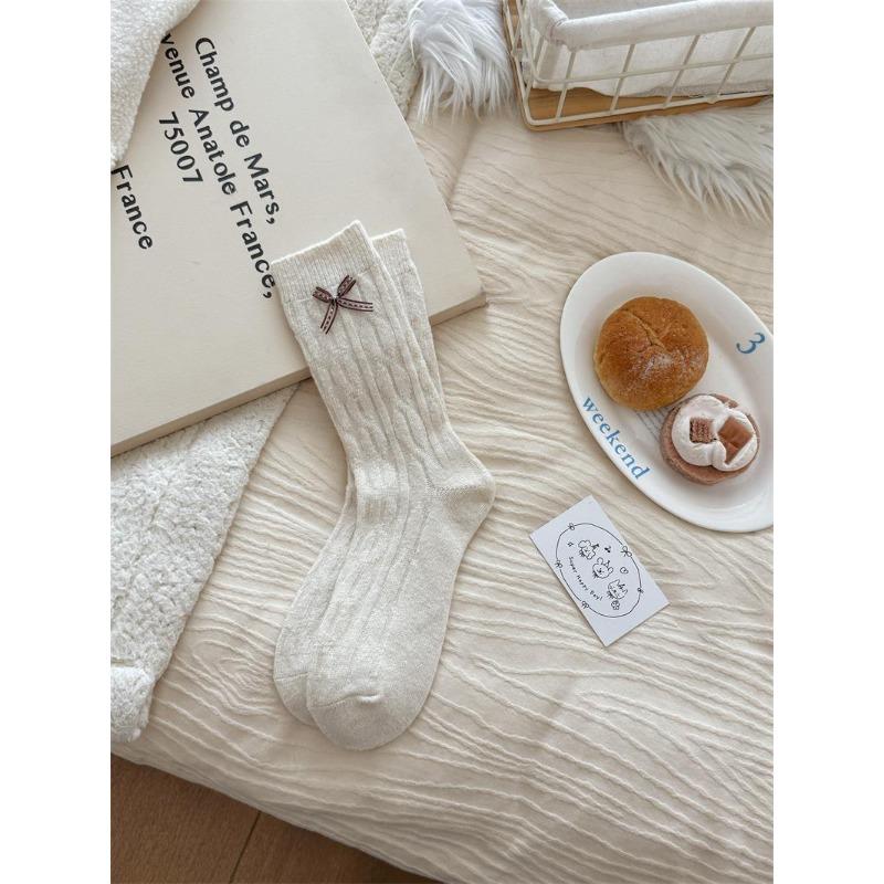 Pure Color Wool Knitted Thickened Butterfly Knot Pile-up Socks for Children, Suitable for Autumn and Winter, Providing Warmth.
