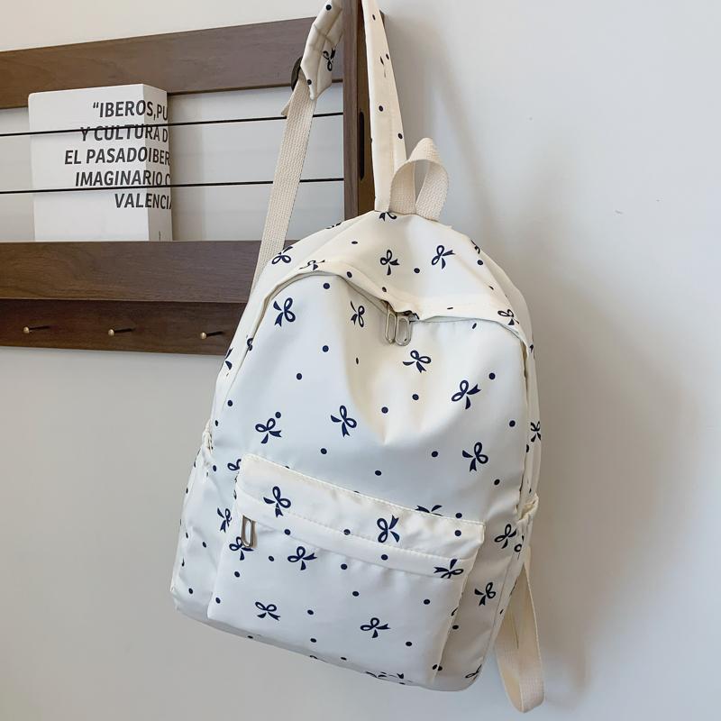 Back To School Backpack Playful Bow Print Bookbag Quilted Comfort and Multi-Pocket Organization System for Women's Campus Life