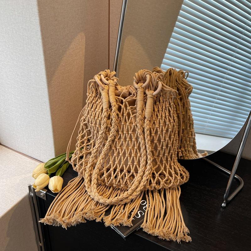 

Женская сумка большой вместимости новая летняя повседневная на плечо для покупок полая плетёная сумка с кисточками сумка-ведро хаки