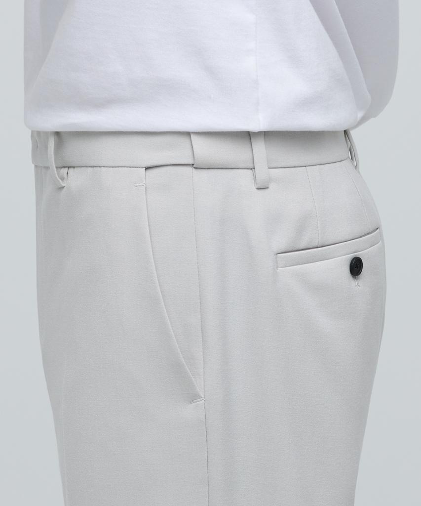 MUSINSA STANDARD Lightweight Tapered Hidden Banding Crop Slacks [Dusty Cream]