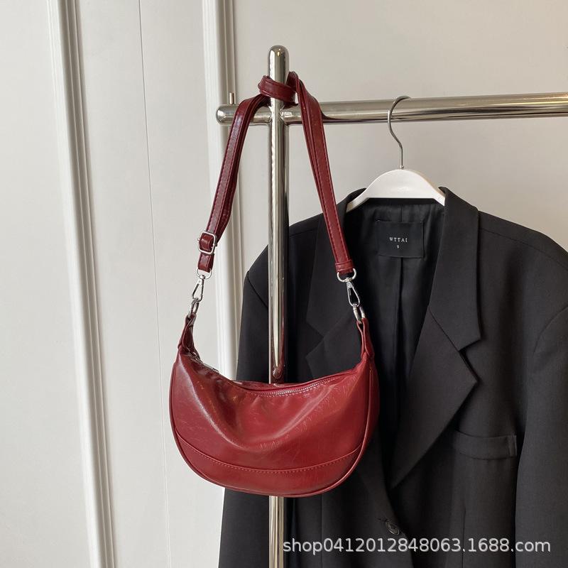 

Модная популярная сумка-мессенджер для通勤, новый нишевый дизайн 2025, из кожи с масляной восковой пропиткой, ретро женская сумка на плечо