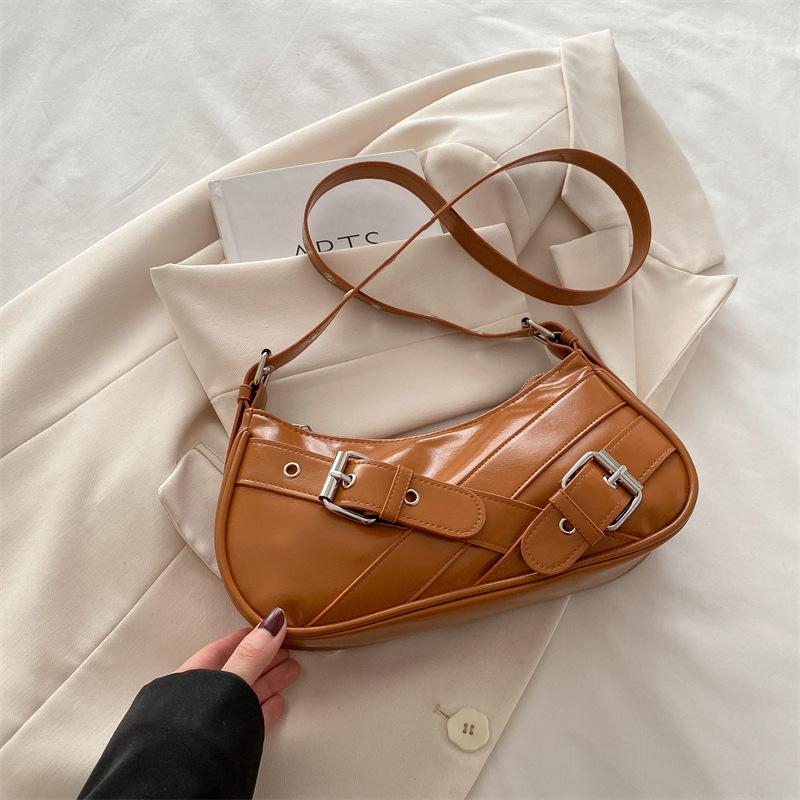 

Модная женская сумка подмышку высокой стоимости 2025 весна-лето новая сумка-локомотив нишевая простая повседневная сумка через плечо коричневый