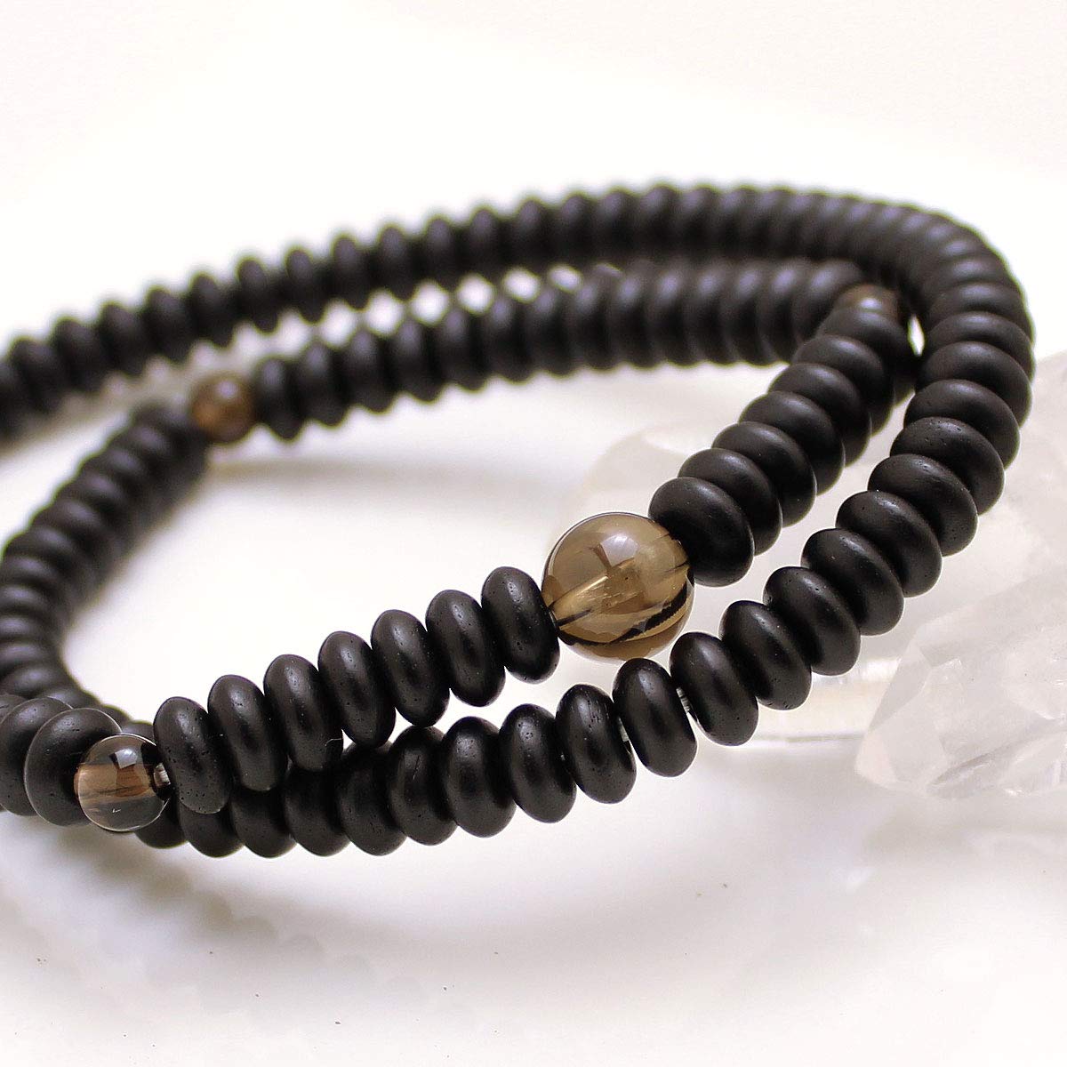 

108-bead prayer beads bracelet with ebony and brown quartz. Free rubber replacement.
