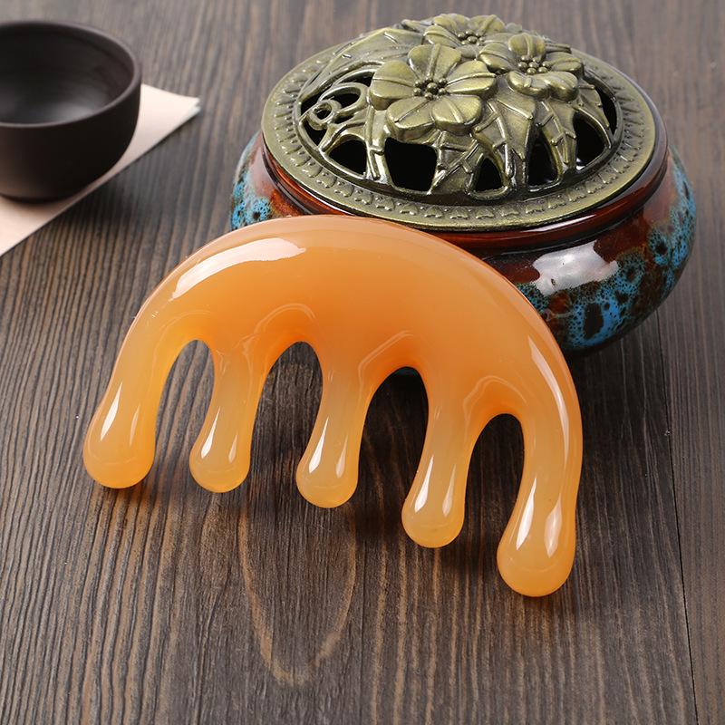 One Piece Gold Sandalwood Five-Tooth Massage Comb for Head and Meridian Stimulation.