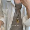 Niche design minimalist water drop pendant long necklace women's high-end sense cold leather rope sweater chain with accessories