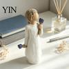 Minimalist Desk Ornament Girl Holding Bouquet Resin Figurine, Faceless Lady Statue, Romantic Desktop for Flower Statue Living Room Bedroom Home Decor,