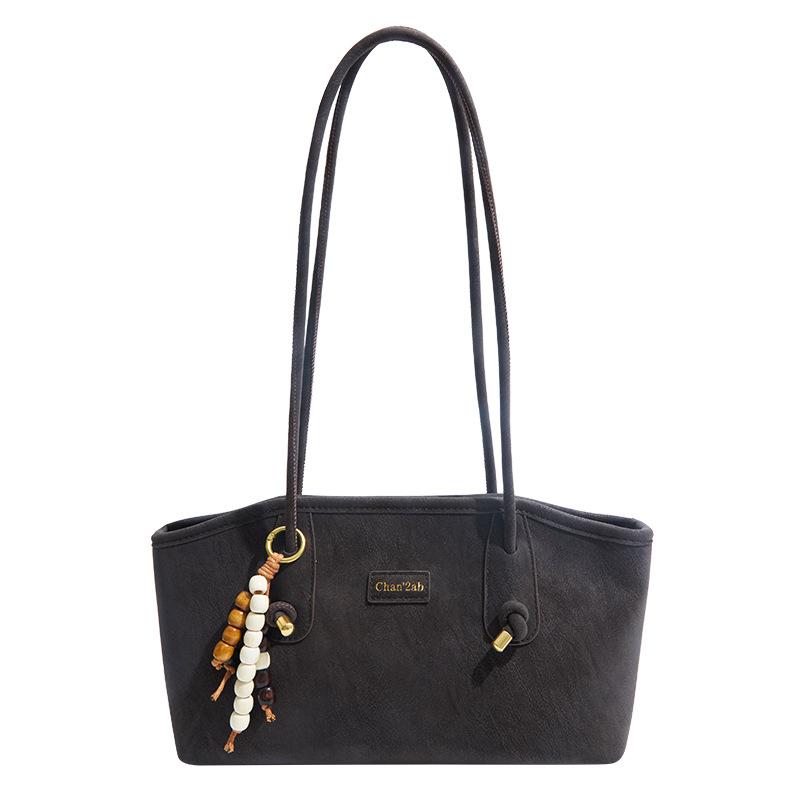 

Korean version of niche casual shoulder bag retro simple commuter underarm bag women s 2025 new fashion portable tote bag