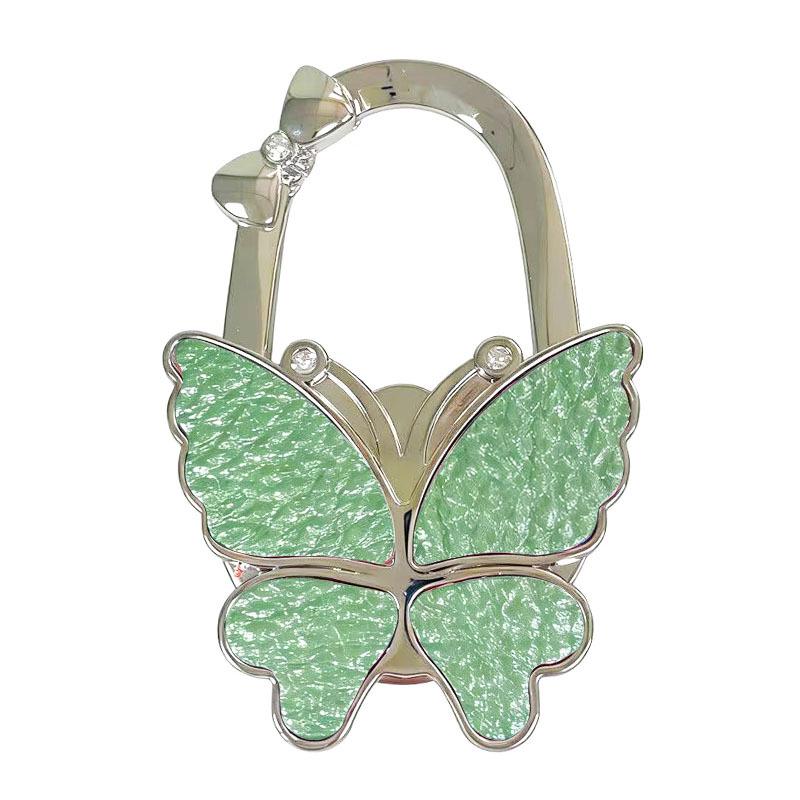 Large Matte Butterfly Hanging Bag Hook - Foldable Women's Bag Buckle & Portable Table Edge Hook for Luggage Accessories.