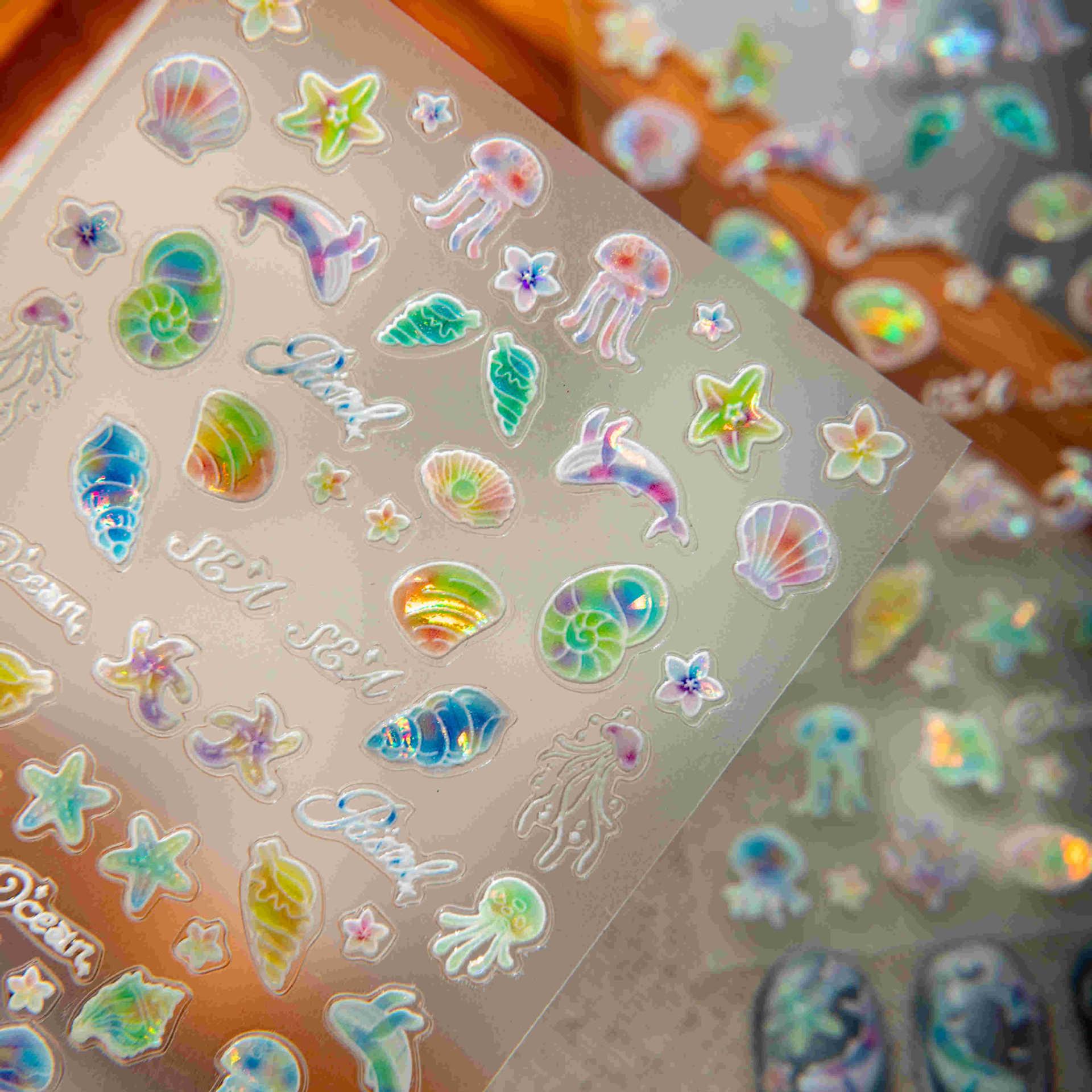 

Ocean World Nail Art Stickers: Starfish, Shell, Jellyfish, Coral Designs for DIY Baby Nail Decoration Ocean World [1 Piece]
