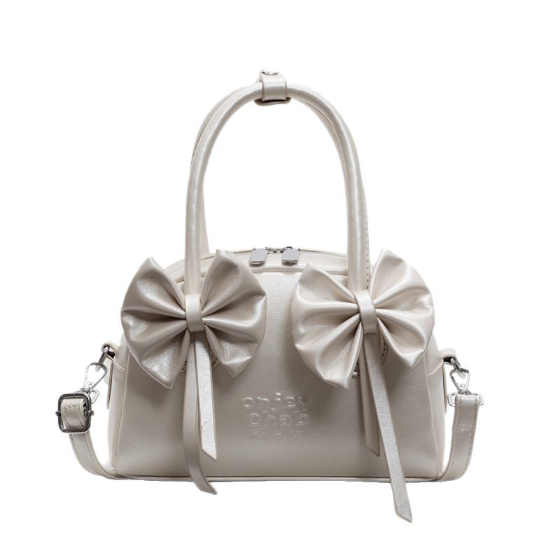 Shoulder bag fresh 2025 new women's bag Korean fashion bow new hand-to-hand small women's bag crossbody shell bag