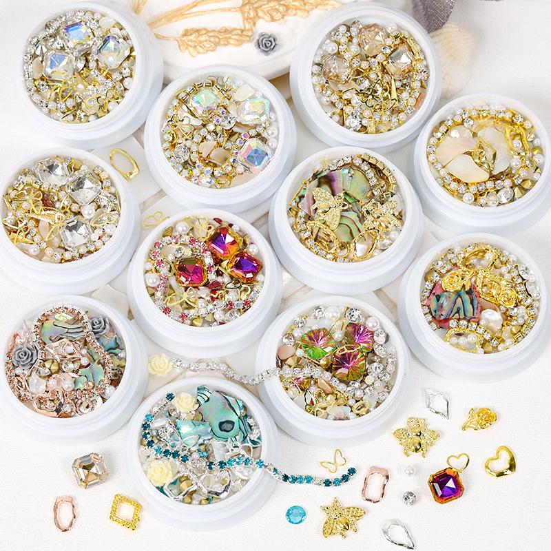 Dolphin Bay Nail Art: Shell Pieces, Rhinestones, Pearls, and Metal Chains Mixed Decorations