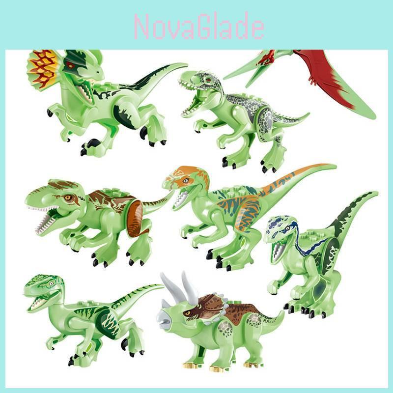 Conjunto de 8 blocos de montar fluorescentes de dinossauros jurássicos para crianças. Material atóxico e seguro.