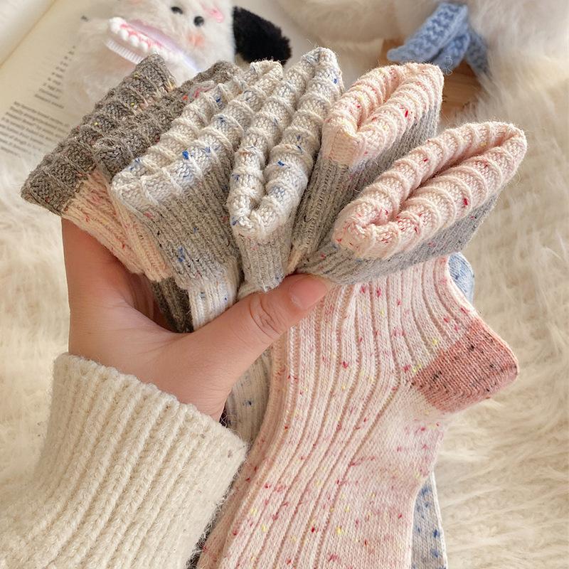 Girls Who Keep Their Feet Warm In Autumn and Winter Can Come Up with Some Warm Woolen Socks. Multicolored Mid-calf Socks Are Versatile for Ladies
