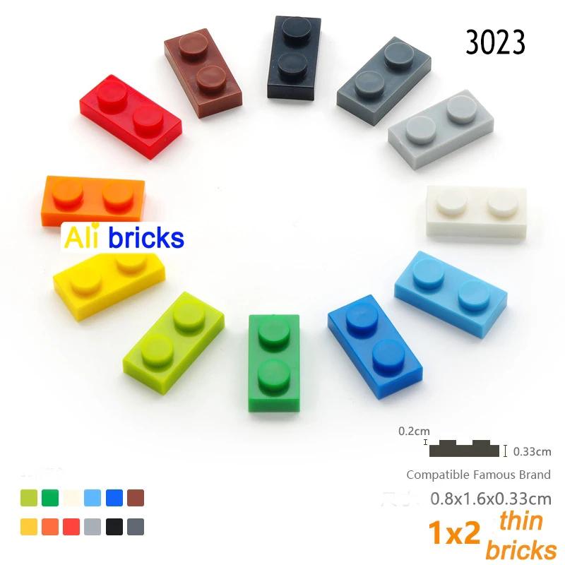 50pcs DIY Building Blocks Thin Figures Bricks 1x2 Dots 12Color Educational Creative Size Compatible With 3023 Toys for Children