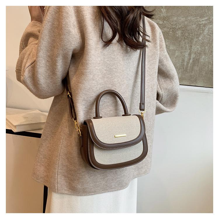 Borsa a sella portatile con texture premium da donna, nuova borsa a tracolla messenger retrò alla moda con inserti a contrasto di colore