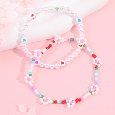 Kids' Two-Piece Bracelet Set: Xiaomi Beads & Daisy Flower Rice Bead Design