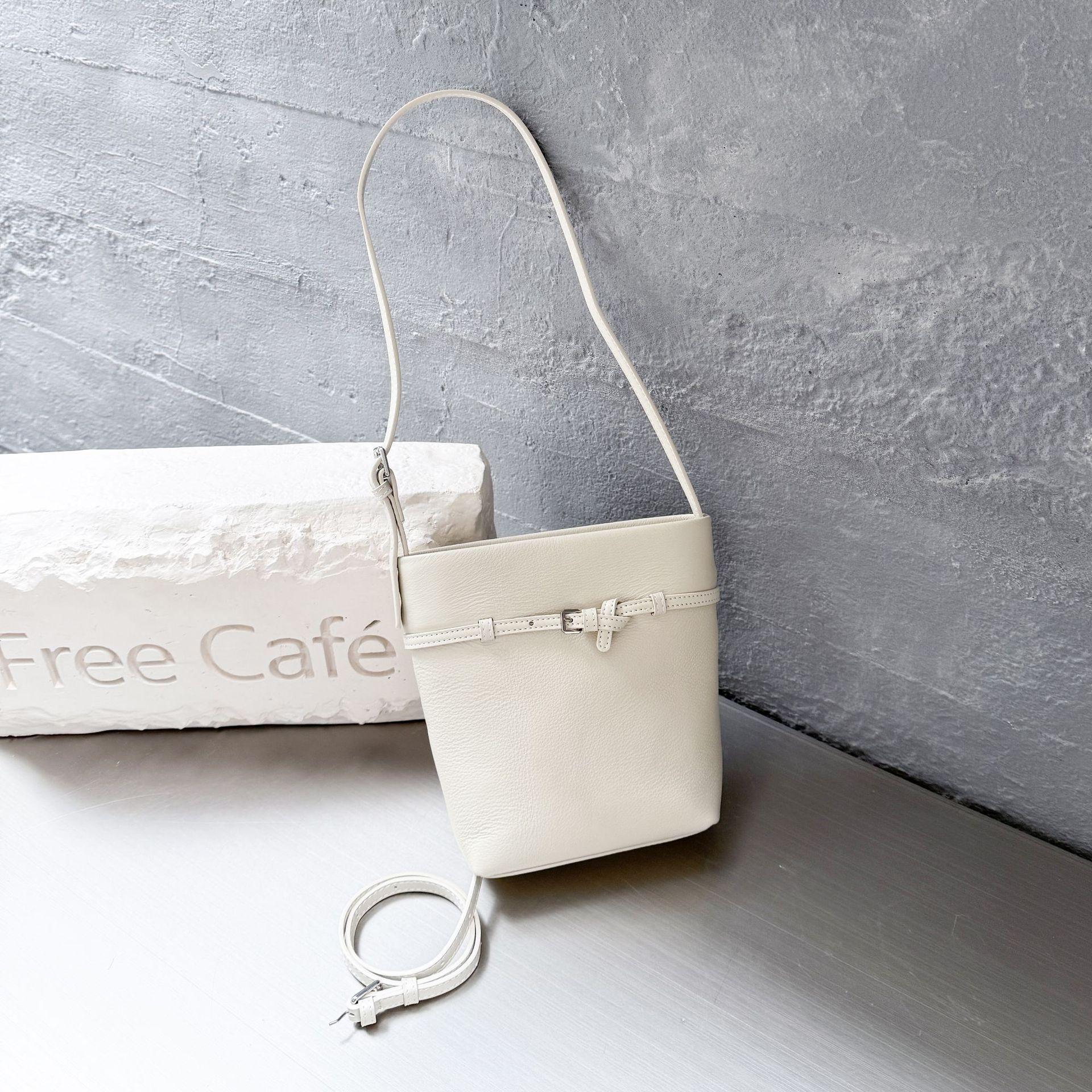 

Сумка из воловьей кожи Niche Light Luxury женская сумка Hand Grab Card Bag простая женская сумка для мобильного телефона с мелочью белый