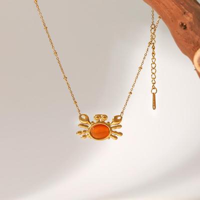 Collana in Acciaio Titanio Occhio di Gatto Arancione Europeo e Americano: Gioielli Eleganti, Inossidabili e Inalterabili in Acciaio Inossidabile per Donna.