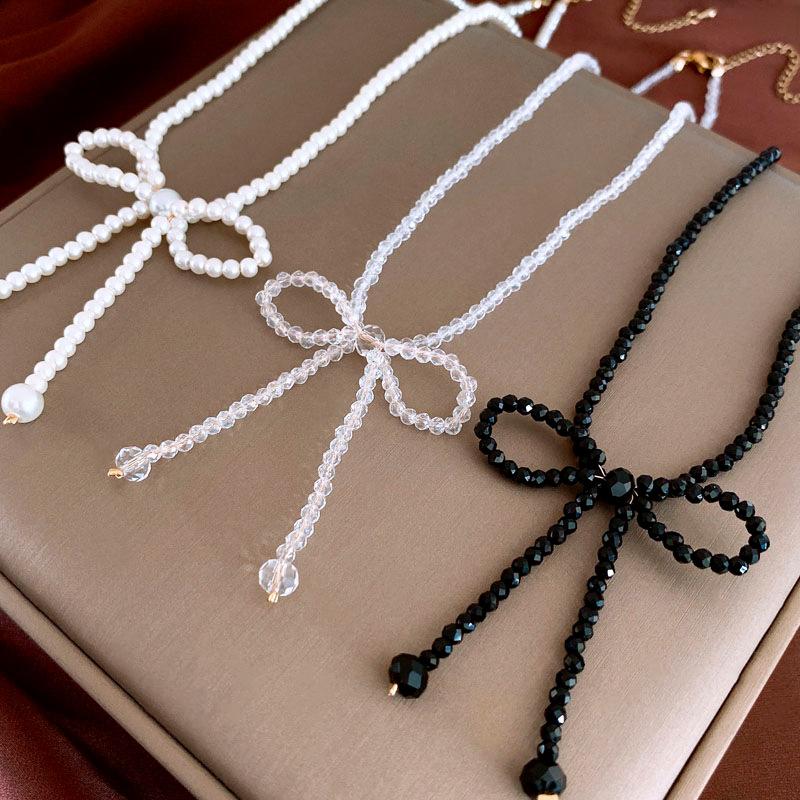Sweet imitation pearl crystal woven bow collarbone necklace super fairy niche high-end choker necklace