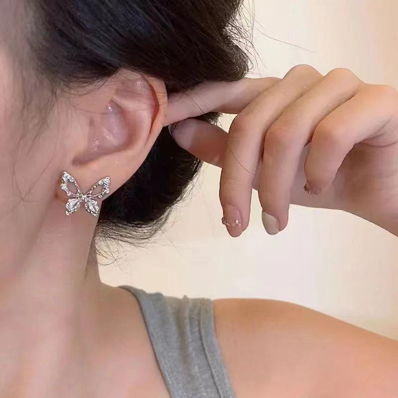 Silver needle super fairy hollow butterfly stud earrings women's niche design exquisite earrings high sense fashion versatile earrings