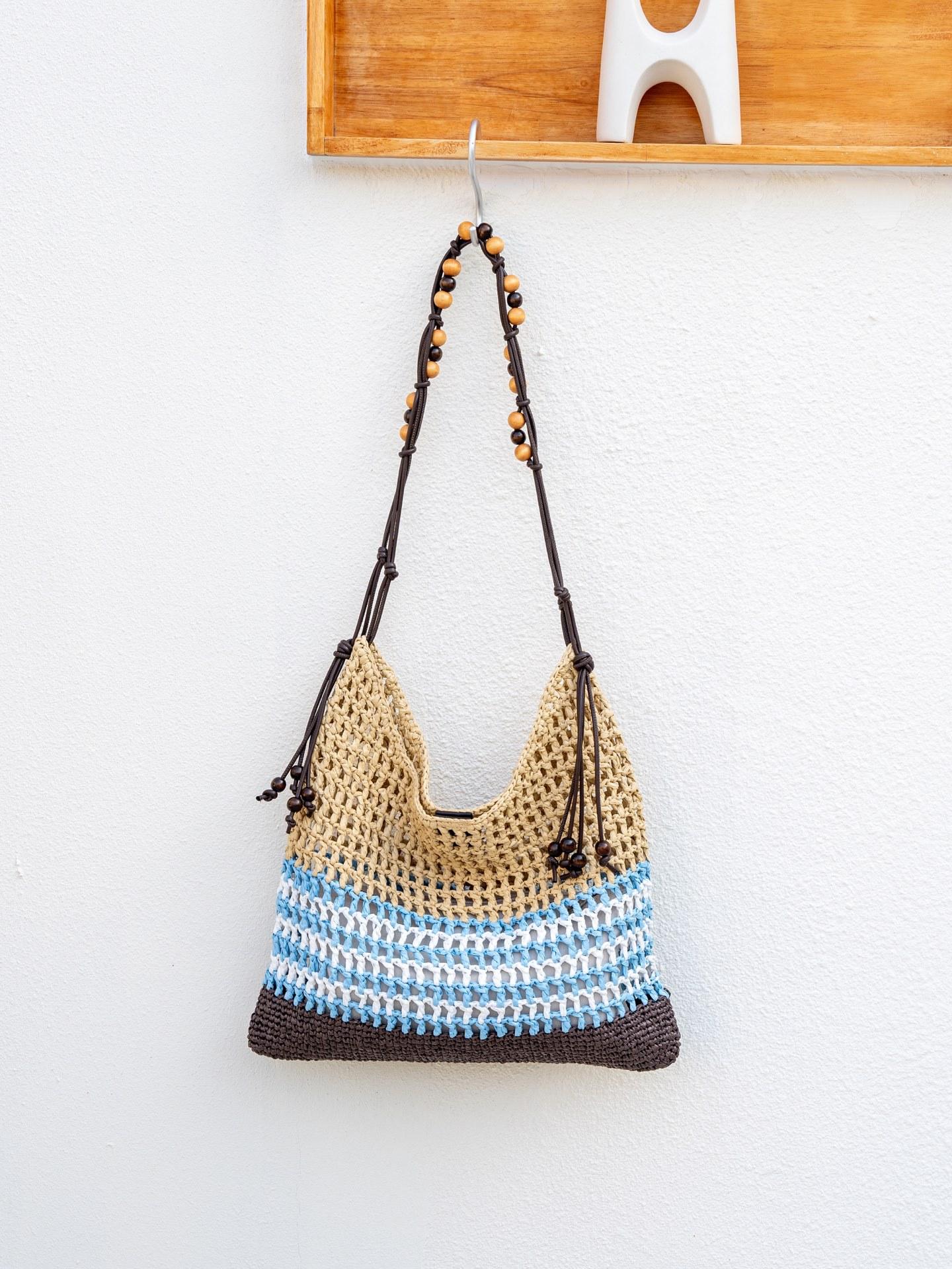 Hollow woven tote bag women s new knitted portable shoulder bag commuter versatile bag red bag knitting