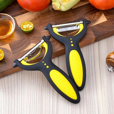Sbucciatore e Grattugia Frutta 2-in-1 Multifunzionale Grattugia Verdura e Frutta Grattugia Mais Grattugia Patate Melone Sbucciatore