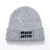 Miu Prémiová podzimní/zimní vyšívaná vlněná čepice s ochranou uší