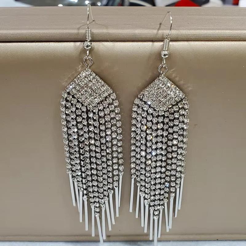 

Роскошные и высокочувственные золотые серьги-джокеры с длинной кисточкой, модные, атмосферные, персонализированные, ежедневные серебряный