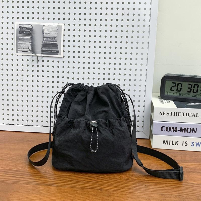 Simple trendy brand small satchel women's lightweight nylon mobile phone bag lazy pleated drawstring messenger bag men's shoulder bag