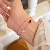 Elegantes französisches doppelreihiges Perlmutt-Herzarmband