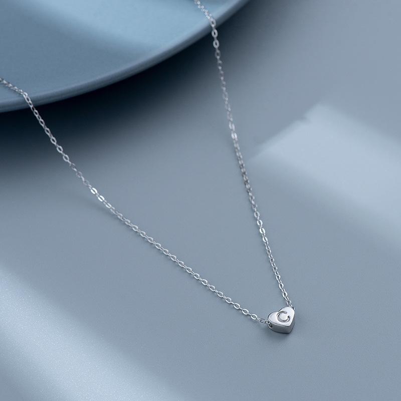 S925 Silver Heart-Shaped Initial Necklace - Korean Style Clavicle Chain with Trendy Peach Heart Design.