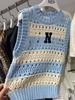 Nordic Autumn Logo Knit Sleeveless Striped Sweater Vest