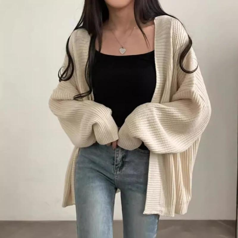 Autumn and winter simple solid color lazy loose casual versatile medium and long sweater jacket women's knitted cardigan