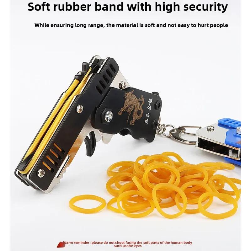 1PCs Elastic Leather Rubber Band Shooting Pistol Kid Outdoor Party Folding Toy Gun Soft Bullet Gun Keychain Fidget Toys