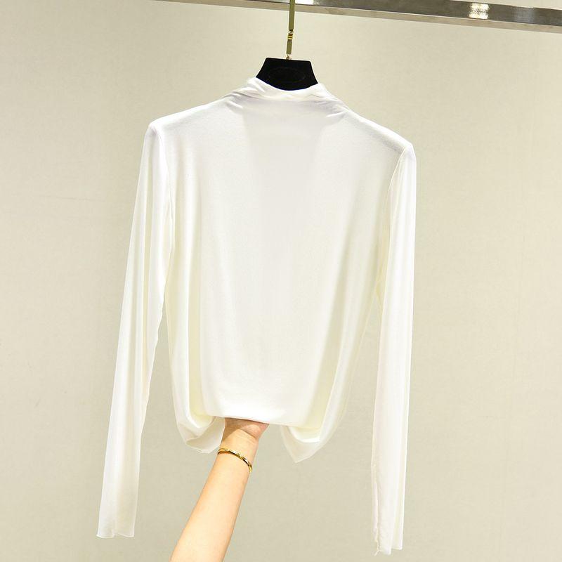 

Женская весенне-осенняя модальная футболка с полувысоким воротником для внутреннего ношения, модная с длинным рукавом, осенняя одежда, облегающая, простейшая для сочетания, подчеркивающая фигуру White XL (60.00 kg-70.00 kg recommended