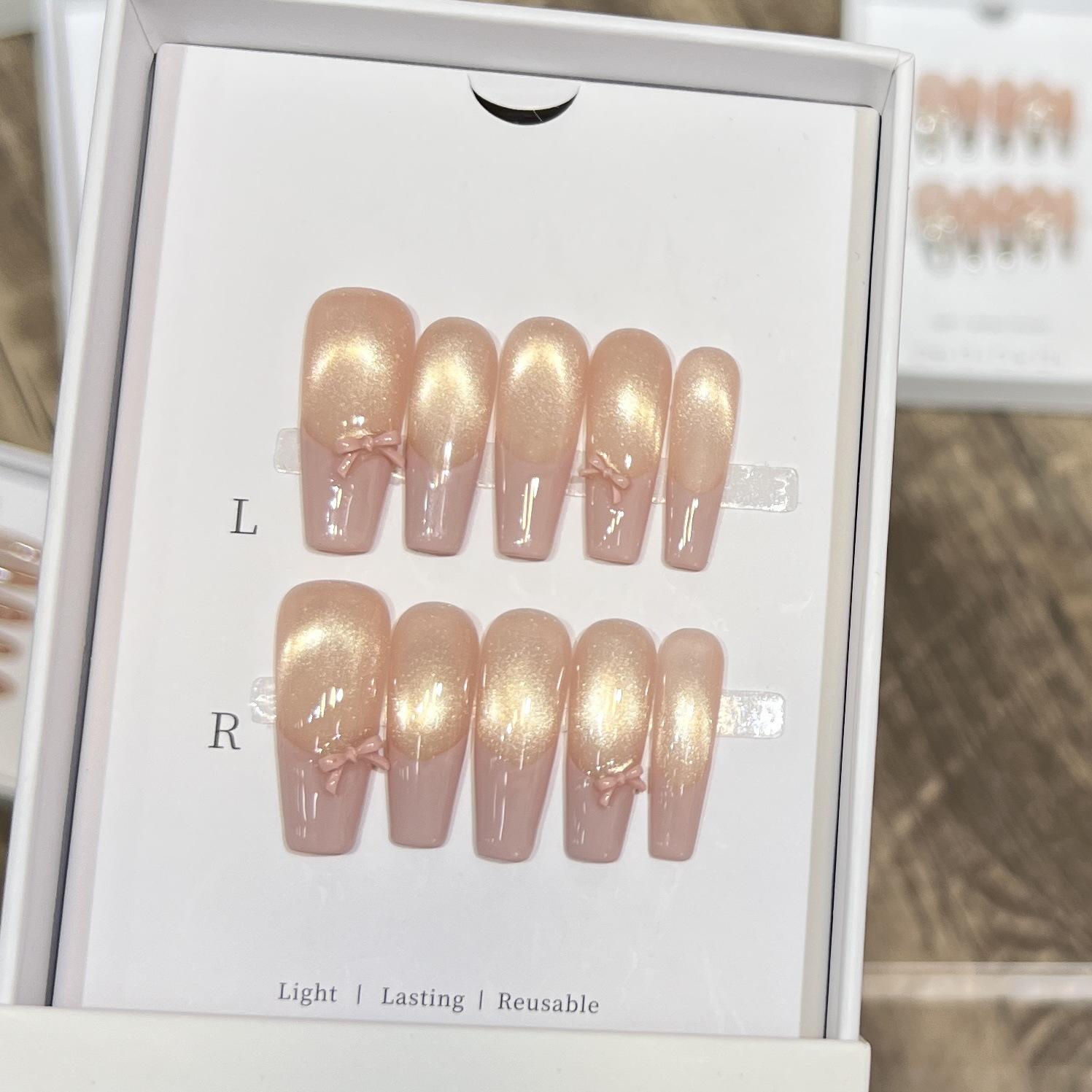 

Pink Whisper: Handmade Removable Wearable Nails - Nude Gold Cat Eye French Bow Design Medium (M)