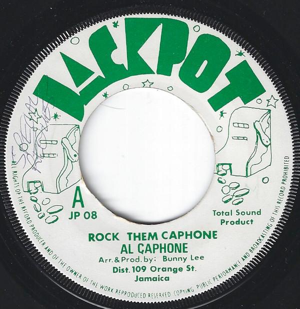 

7inch Record DENNIS ALCAPONE ,AL CAPHONE THE AGG - Rock Them Caphone / Rock Them Capon JP08 Jackpot Jamaica Reggae, Ska & Dub Used