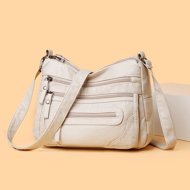 

Новая женская сумка через плечо из мягкой искусственной кожи, большая вместимость, модная простая многокарманная многослойная сумка для мам среднего возраста белый