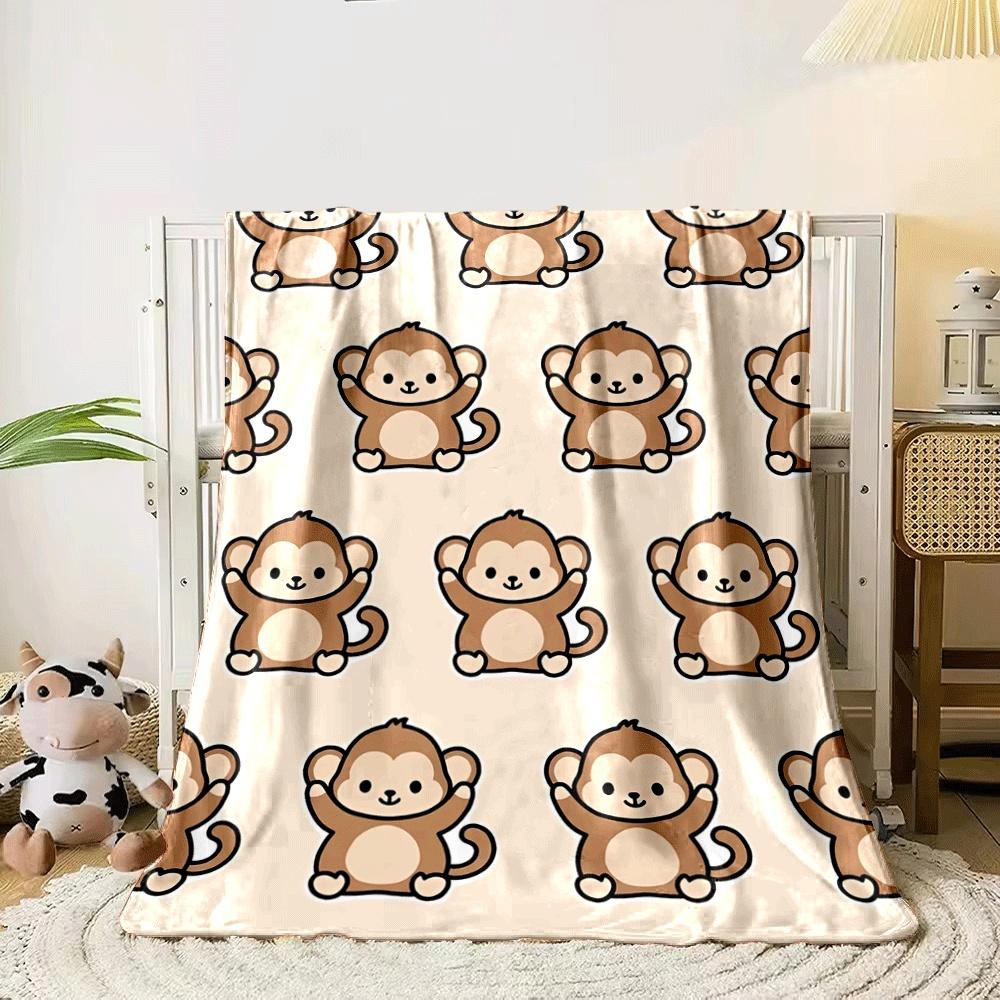Cartoon monkeys with raised arms repeated on a beige background. for all seasons blanket lunch break throw gift