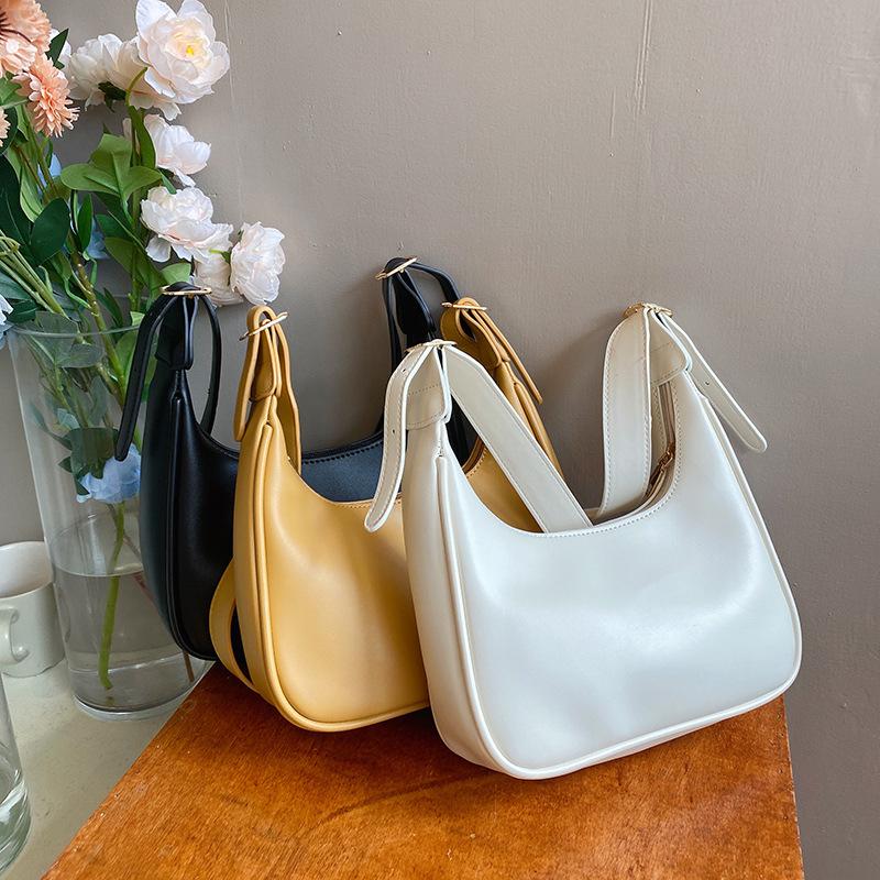 

Bag women s retro armpit large capacity 2025 simple daily handbag crescent shoulder crossbody dumpling bag women s tide коричневый