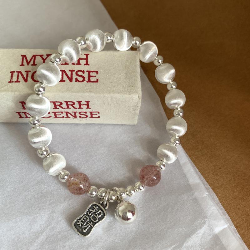 2024 Nový styl Dámský vynikající laserový náramek s křišťálem kočičího oka a jahodovým křišťálem – Módní a všestranný špičkový šperk