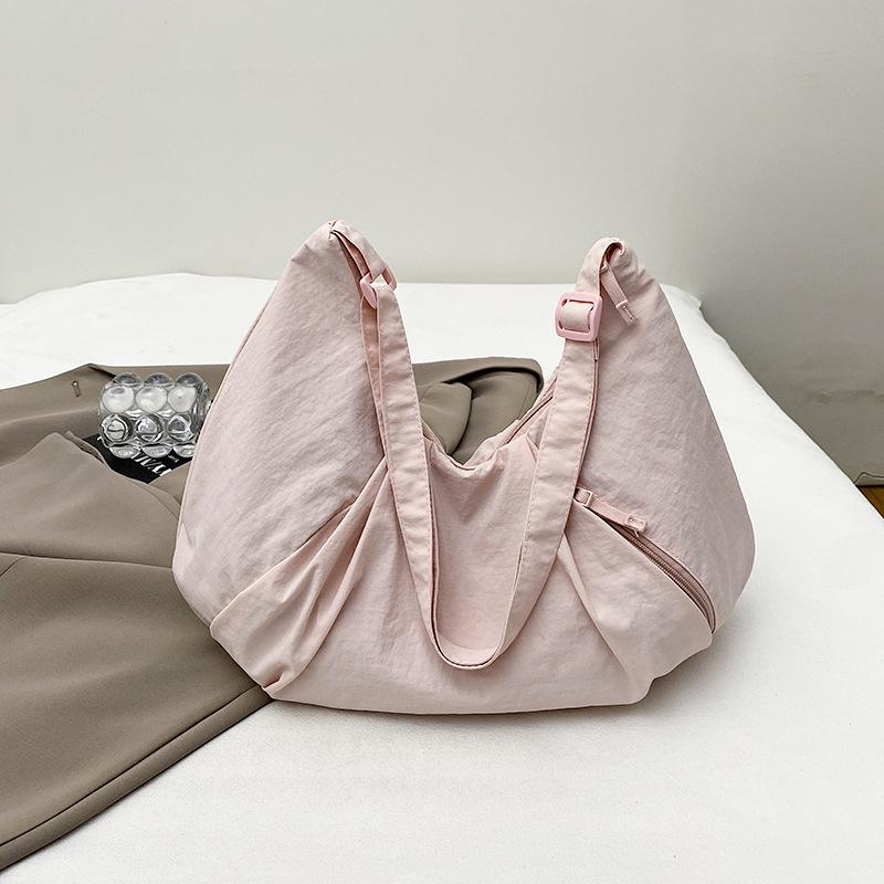 

Вместительная тканевая сумка на молнии для поездок на работу, большая сумка 2025, новая легкая и универсальная сумка через плечо, простая сумка-тоут, сумка-мессенджер, тренд розовый