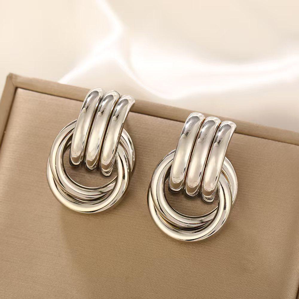 Europäisch-Amerikanische Geometrische Twist Kreis Ohrringe – Stilvoll, Mehrschichtig und Vielseitig