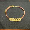 Exquisite Women's Red String Bracelet with Gold Crushed Ice Beads and Five Emperors Coins – Versatile and Stylish.